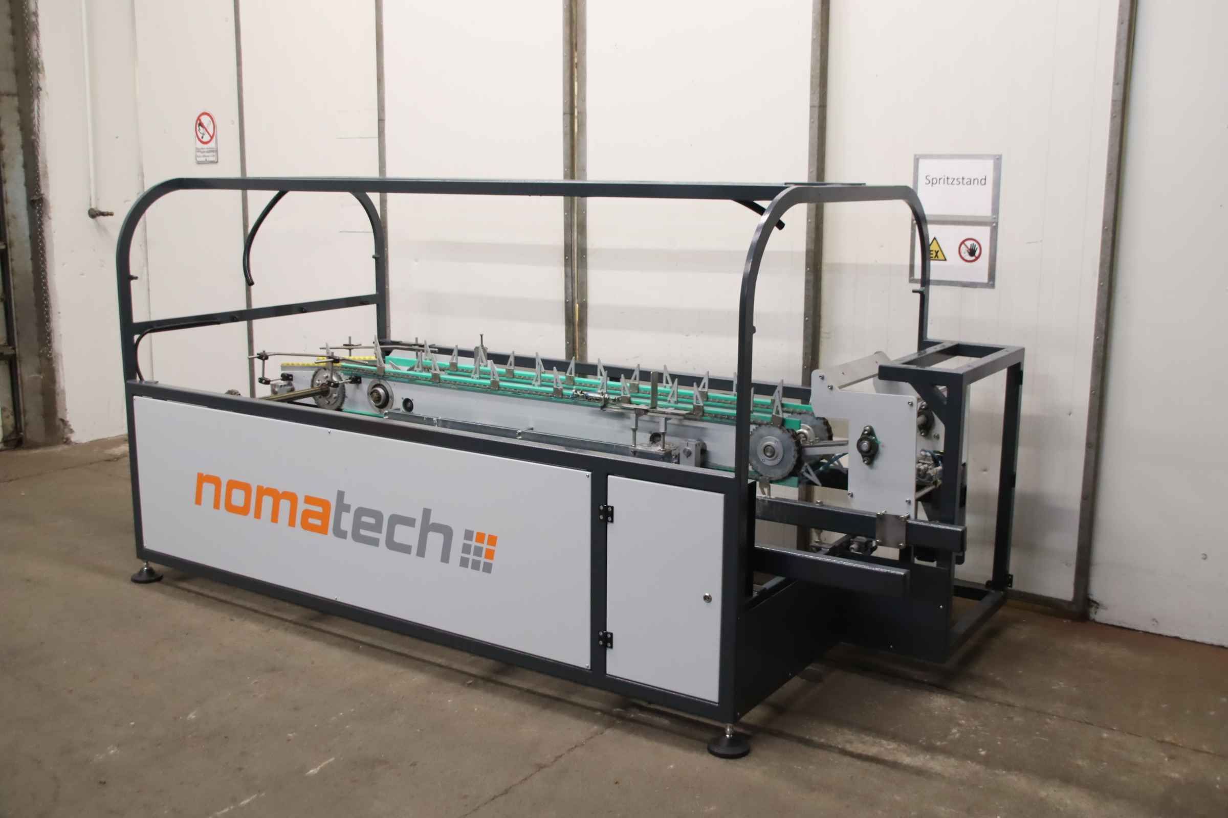 Kettenförderer für Horizontaler Kartonierer von nomatech - BOX 60H